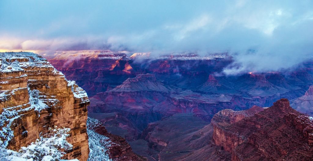 snow dusting at the grand canyon and a purple glow