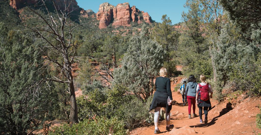 group of friends on a hiking trail in sedona