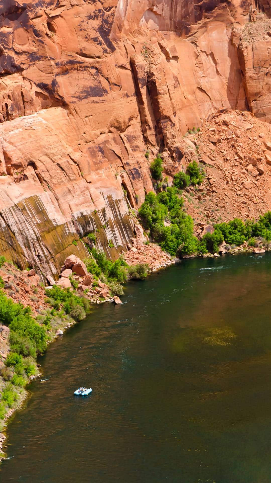 aerial view of a raft floating down the colorado river