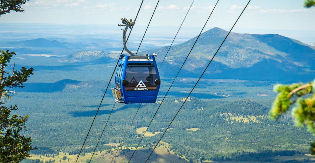 blue gondola in the summer at snowbowl