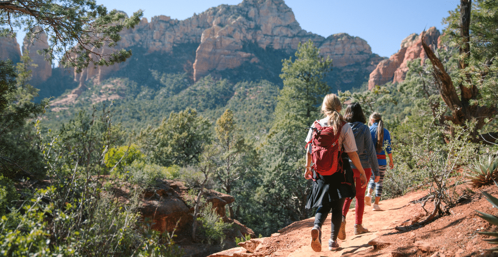 group of women hiking near sedona