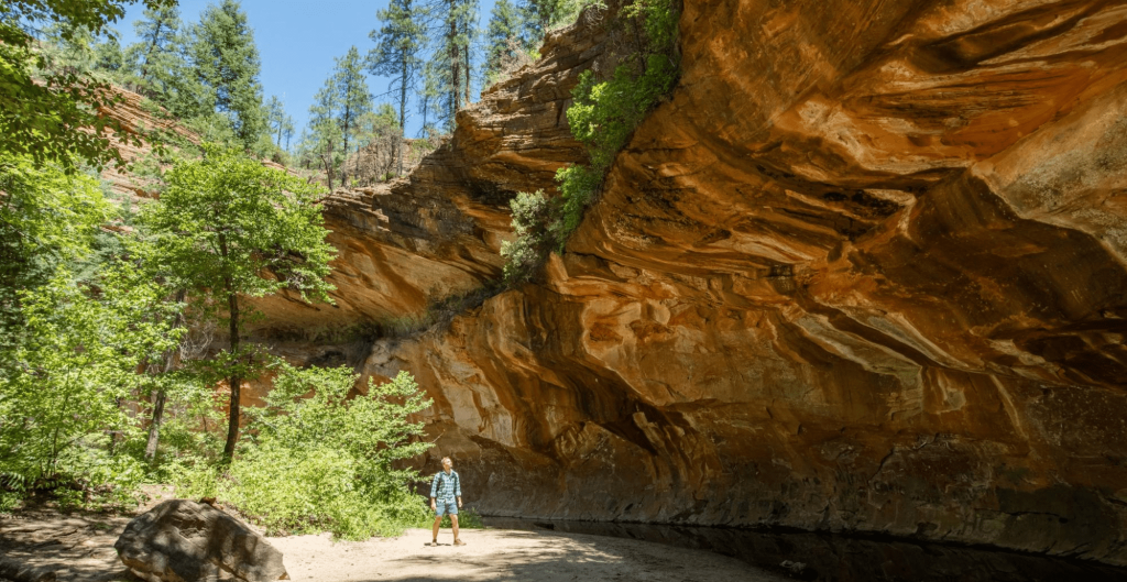 person hiking at west fork trail near sedona, arizona